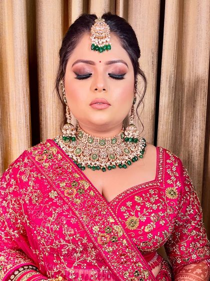 A close-up on the eye makeup. The soft smokey effect with a hint of shimmer adds depth and dimension, making the eyes pop.