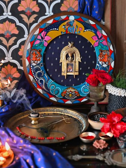 The Rahu frame, set amidst a mystical arrangement of incense and deep blue silks. The artwork captures the chaotic, mysterious, and powerful nature of Rahu, the north node of the moon, often depicted as a bodiless dragon.