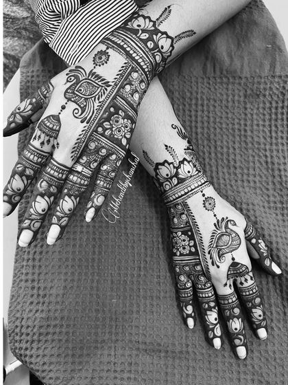 A black and white version of the same Karwachauth design, highlighting the beautiful patterns and line work.