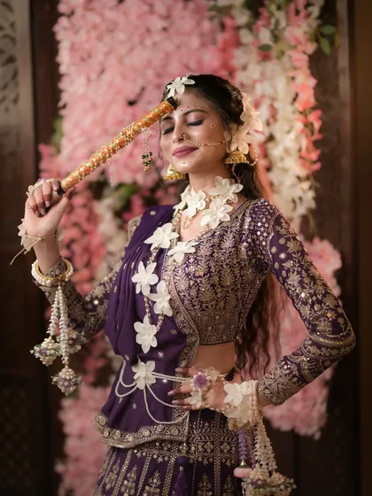 A playful and divine shot of Radha with the flute.