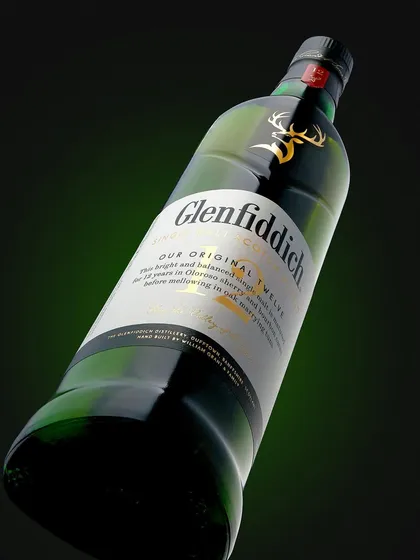 The Glenfiddich "Green Lantern" shot. I wanted to create a perfect marriage between the darkness and the bottle's signature green glow. The highlight on the golden deer logo makes it feel animated, bringing the brand's icon to life.