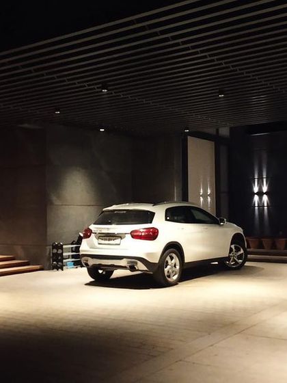 Even functional spaces like a driveway and parking area are an opportunity for thoughtful lighting design. Here, we used recessed downlights to provide safe, ample illumination while maintaining a clean, sophisticated aesthetic that complements the home's architecture.