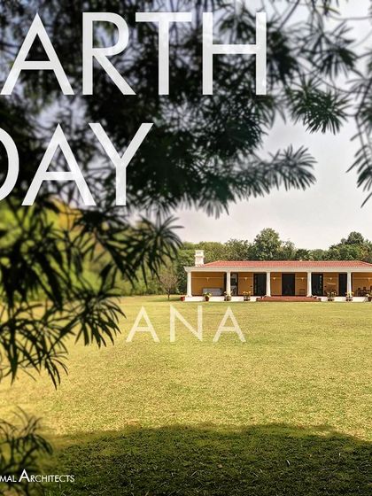 The Mustard Farmhouse project, viewed through the surrounding foliage. My landscape planning here focused on creating a sustainable environment that feels established and integrated with the local ecology.