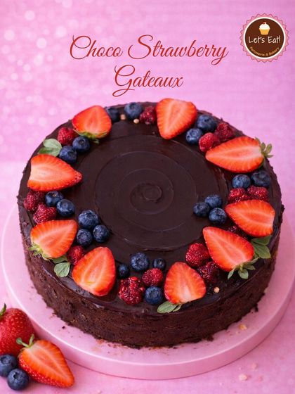 This Choco Strawberry Gateaux is a truly decadent celebration of the season. A rich chocolate cake is generously topped with a smooth chocolate ganache and a beautiful arrangement of fresh strawberries and blueberries.
