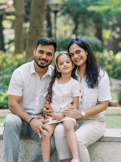 A classic family portrait, with everyone dressed in white. The clean, timeless look is always a beautiful choice.