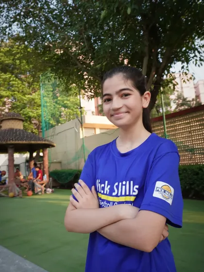 This player's confident smile says it all. We encourage our athletes to pursue what brings them joy, and that passion is the key to unlocking their full potential on the court.