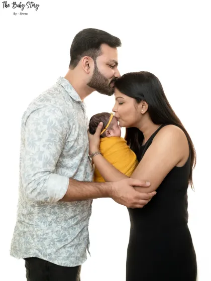 A complete family portrait is a beautiful way to announce your new arrival. I guide families into natural poses that show the love and joy of this special time.