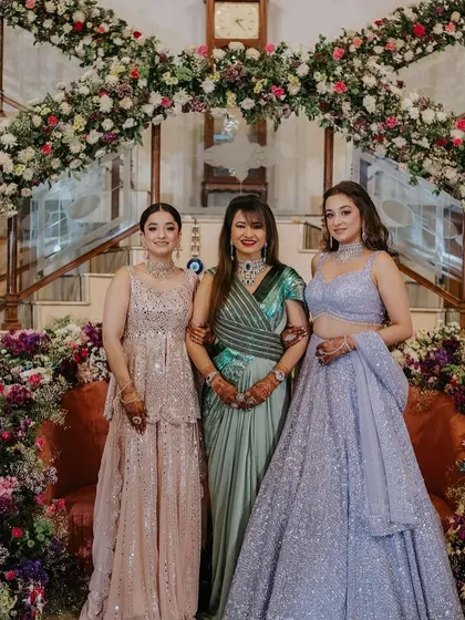 A family portrait where the bride's beautiful wavy hairstyle is on display.