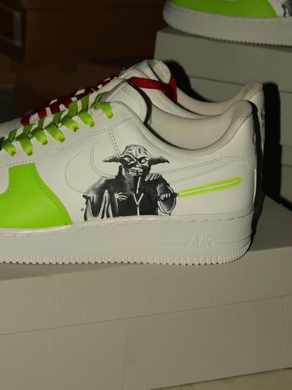 A close-up of the Yoda side of the custom Star Wars AF1s. I used a grayscale painting style to capture his wise and powerful look, with his green lightsaber adding a pop of color.