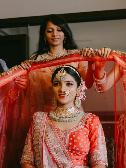 A beautiful shot of the bride getting ready, capturing the anticipation and happiness of the moment.