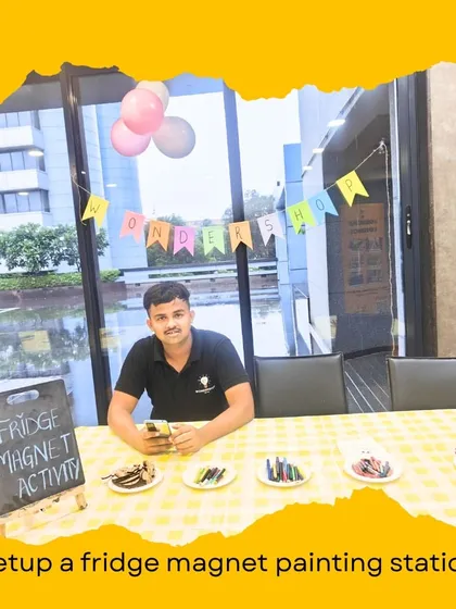 Here's our host at the fridge magnet painting station, ready for a fun-filled afternoon. We ensure our team is prepared and enthusiastic to make the party a success.