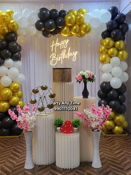 A full view of the black and gold birthday setup in my Kanakapura party hall. It's a great place for affordable celebrations.