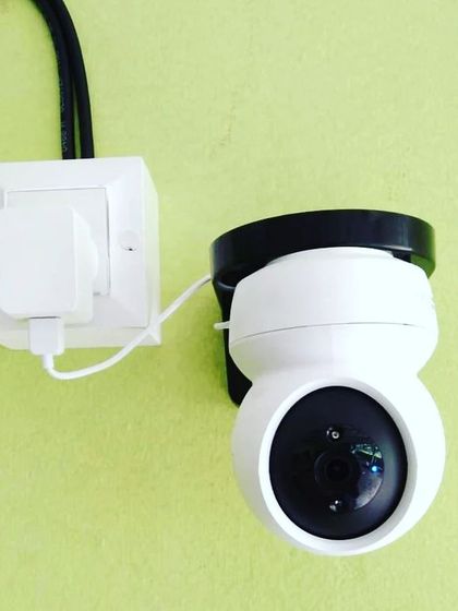 A wireless camera installed and powered up. These cameras are perfect for renters or anyone who wants a clean, wire-free installation.