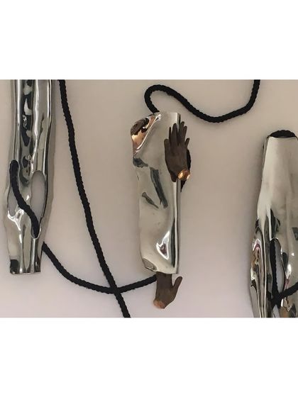 A detail of an art installation I created for my sister’s house 15 years ago, one of my earliest experiments with combining steel, rope, and figurative elements.