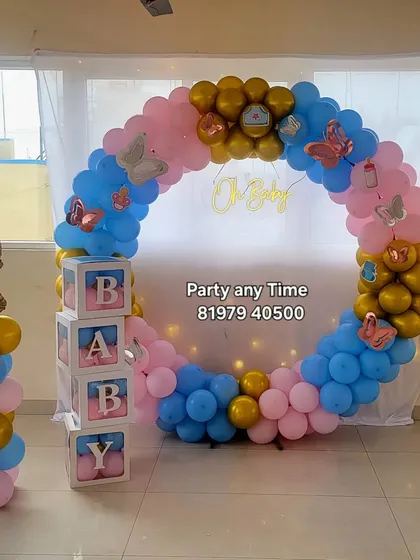 Another shot of the pink and blue "Oh Baby" decoration, perfect for celebrating the new arrival.