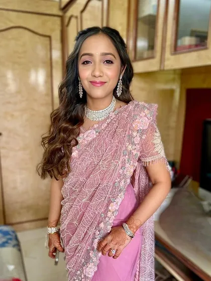 Serving soft glam and stealing hearts. This dusty rose look is perfect for a bridesmaid or wedding guest who wants a subtle yet stunning appearance.