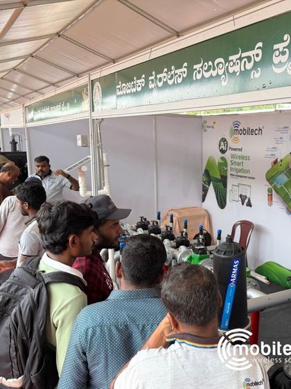 A crowd gathers to see our smart irrigation technology in action at Krishi Mela.