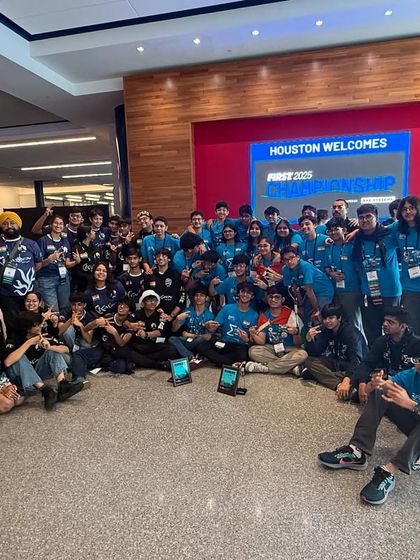Both of our FRC teams, Sigma and Kaizen, united at the World Championship in Houston. This image captures the spirit of collaboration and shared success that defines our academy's approach to competitive robotics.