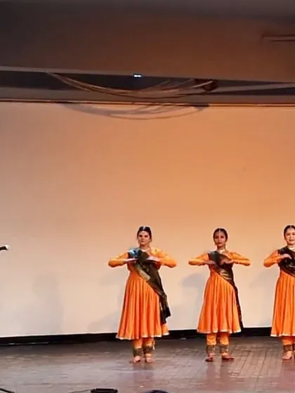 The beautiful sight of dancers and musicians creating art together on stage.