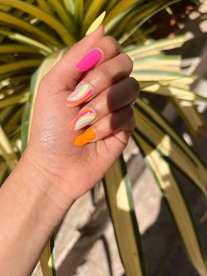 Another shot of these vibrant summer nails, showing off the amazing color combination in the sunlight.