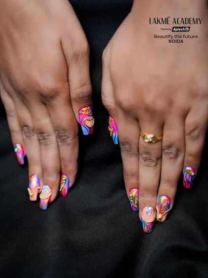 Learn to create vibrant, festival-themed nail art, like this design for Holi. We teach you how to work with bold colours, neon pigments, and 3D embellishments to make every set of nails a celebration.