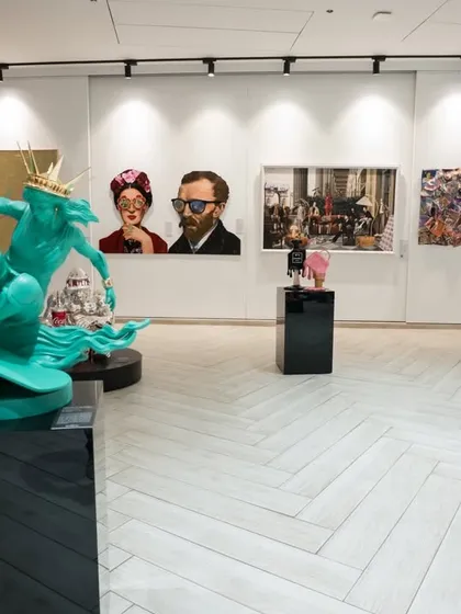 We believe a gallery should be a dynamic stage for art. This view of our space showcases how we curate a dialogue between bold sculptural works and compelling pop art paintings, creating an environment that invites exploration and discovery.
