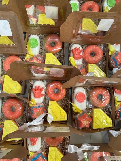 A collection of superhero-themed soap boxes, showing the variety of combinations I can create for a party.