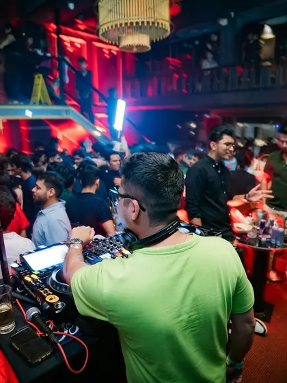A view from behind the console of a completely packed venue. My job is to conduct this energy, and from this perspective, I can see and feel every beat resonate through the crowd.