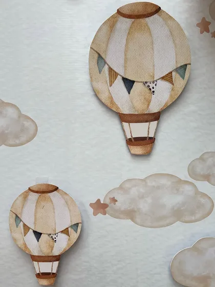 A close-up of the hand-painted watercolor style hot air balloon cutouts used on the main backdrop, showing our attention to artistic detail.