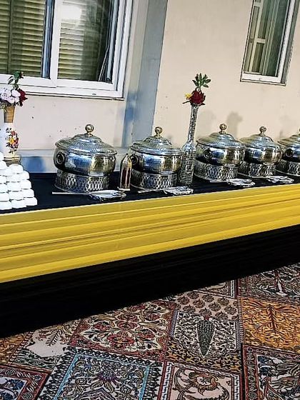 A classic black and gold themed buffet for a private event of 60 guests in DLF Phase 2. This color combination is timelessly elegant and sophisticated.