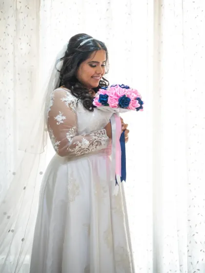 A beautiful bridal portrait by a window. The soft, natural light is perfect for creating elegant and timeless photos.
