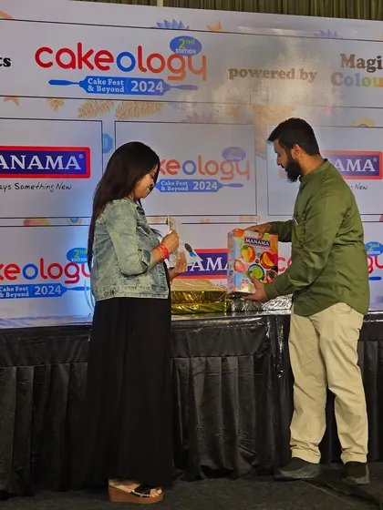 Receiving my gift from one of the event sponsors.