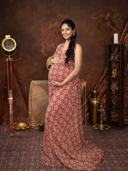 Bringing vibrant South Indian traditions to life. Every detail, from the printed dress to the antique props, was crafted to celebrate her heritage.