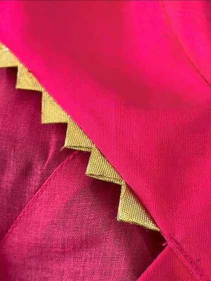 A close-up of the detailing on a custom-manufactured blouse. I ensure high-quality finishing for all B2B orders. Contact me to discuss your production needs.
