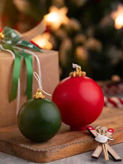 My Christmas bauble candles in classic red and green. They look just like real ornaments but with the added warmth of a flame.