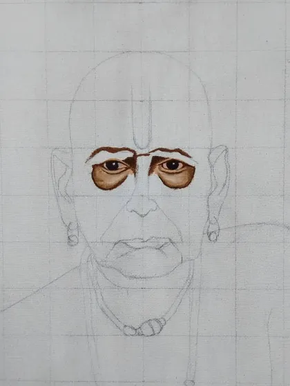 A work-in-progress shot of a commission to paint Swami Samarth. Here, I've just started blocking in the colors for the eyes, using the grid method for accuracy.