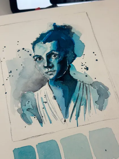 A monochromatic portrait study in blue watercolour, focusing on light and shadow to create a dramatic effect.