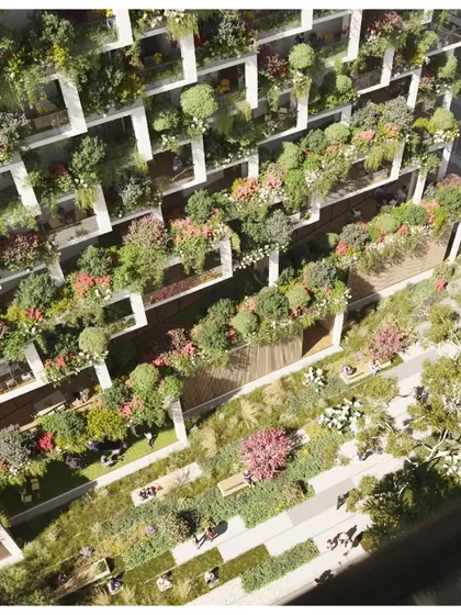 The cascading green terraces of Sky Gardens create a stunning visual effect, appearing as a vertical park that flows down the side of the building.