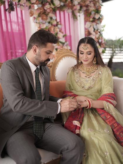 The ring exchange is such a special moment. I made sure her makeup was soft and romantic, with a focus on glowing skin that looked perfect for this daytime engagement ceremony.