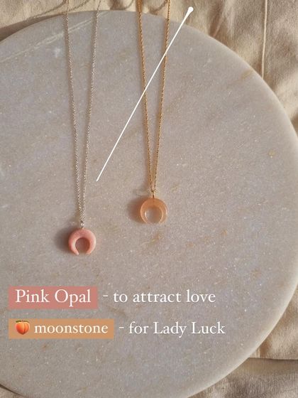 Here you can see my Pink Opal and Peach Moonstone crescent pendants side-by-side. Pink Opal is for attracting love, while Peach Moonstone is for inviting lady luck.