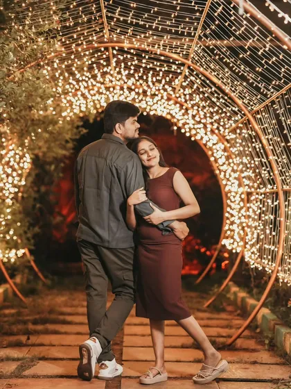 Creating magic in our fairy light tunnel. These night shoots are a favorite for couples who want dreamy, romantic pre-wedding photos.