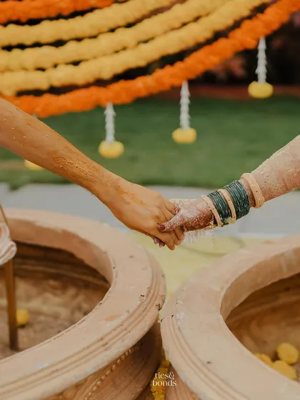 A simple, beautiful moment of connection during the Haldi ceremony. We focus on creating an atmosphere where couples can cherish these traditional rituals together.