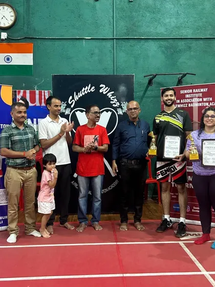 Another group of winners from our internal tournament, showcasing their trophies and the supportive atmosphere of our academy.