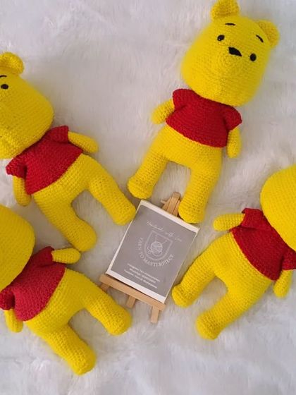 A collection of my Winnie the Pooh soft toys. These 10-inch dolls are made with his classic red shirt and are perfect for cuddling.