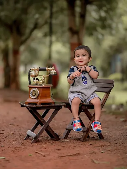 A shy but sweet moment captured during the photoshoot. Even the quiet, gentle expressions tell a beautiful story about a child's personality.