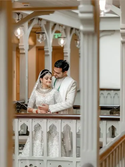 A stolen moment between the couple in a quiet corner of the grand venue. We help find these opportunities for beautiful portraits.