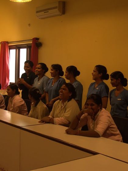 Our therapists enjoying a moment of laughter and camaraderie during a team event. A happy team ensures a positive and healing environment for our guests.