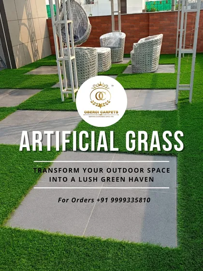 My artificial grass is versatile enough for any design. Here, I've installed it between large tiles to create a clean, modern look for a terrace. This approach combines the softness of grass with the sleekness of stone for a unique and practical outdoor floor.
