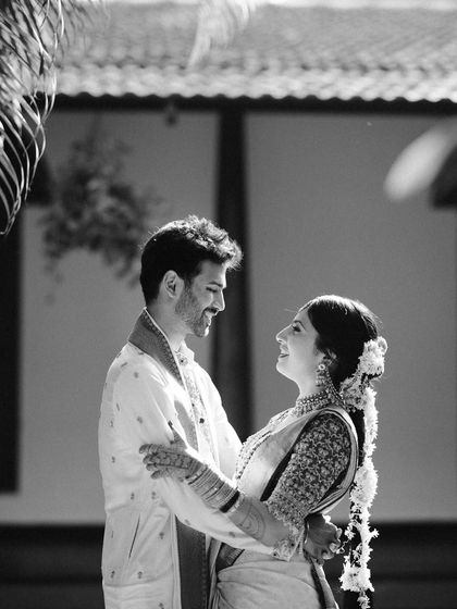 An intimate close-up, with the couple's foreheads touching. The soft light and genuine smiles make this a powerfully romantic and authentic moment.
