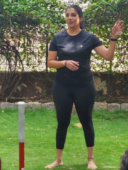 Explaining the nuances of the club swing during a workshop. Proper technique is everything, and I make sure everyone understands the movement before they start.